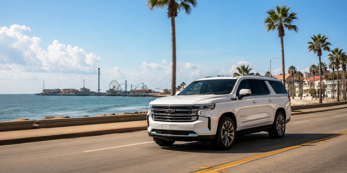 White SUV driving along Galveston Seawall Boulevard